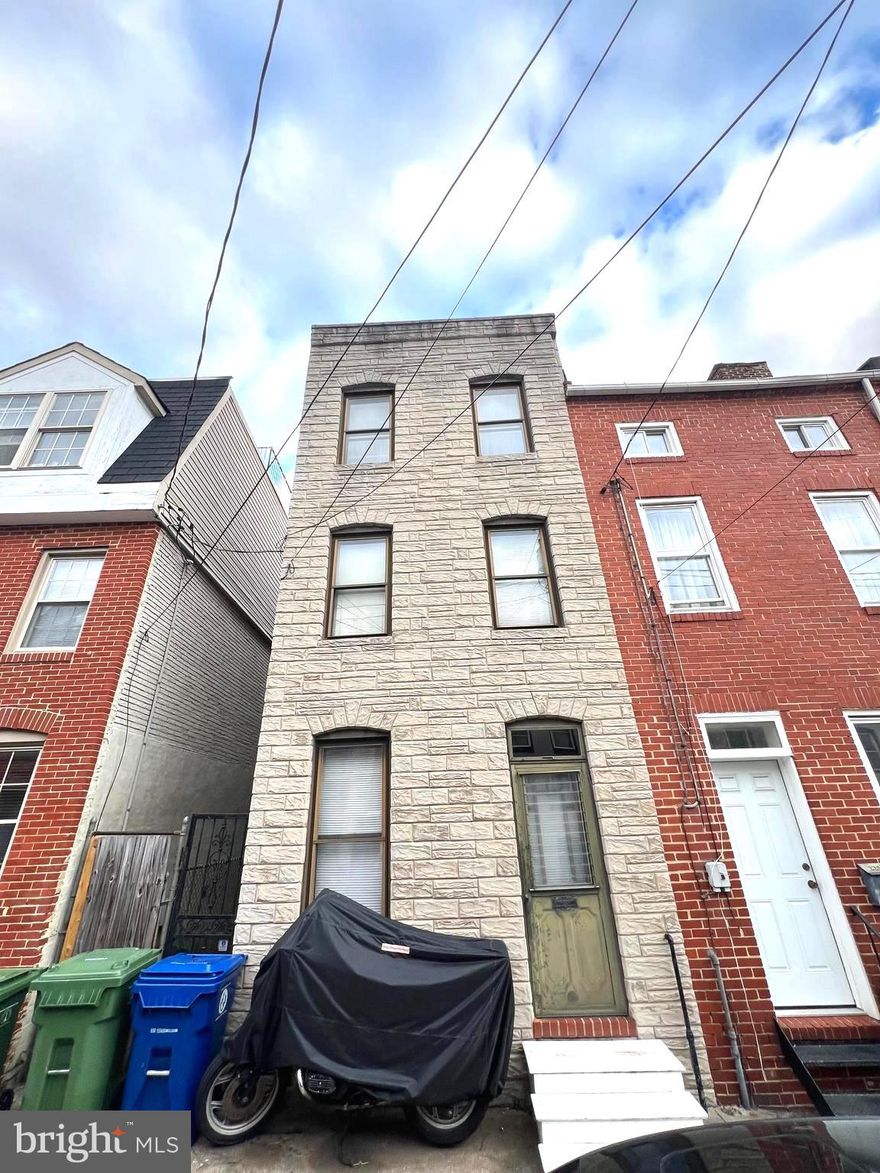 Investor Alert! Prime opportunity in the heart of Upper Fells Point. This spacious 3-level brick townhome offers endless potential for renovation, rental income, or resale. With nearly 1,700 sq ft of living space, tall ceilings, and classic Baltimore charm, this property is the perfect canvas for your next project. 
The layout allows for a flexible redesign — easily convert into multiple units or modernize as a high-end single-family home. Surrounded by strong comps, new construction, and ongoing neighborhood revitalization, this location continues to see solid rental demand and long-term appreciation.
Bring your vision and contractor — a great addition to any investor portfolio in one of Baltimore’s most desirable and walkable neighborhoods!