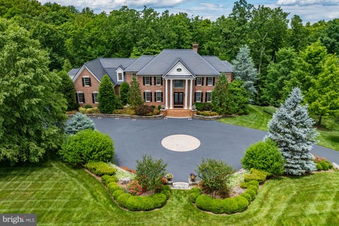 Photo of 21750 Laurel Wood Ct, LEESBURG, VA 20175 (MLS # VALO2129098)