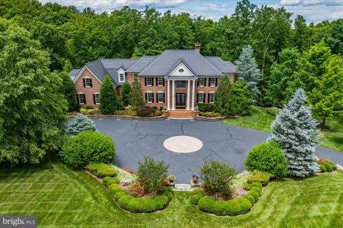Photo of 21750 Laurel Wood Ct, LEESBURG, VA 20175 (MLS # VALO2129098)
