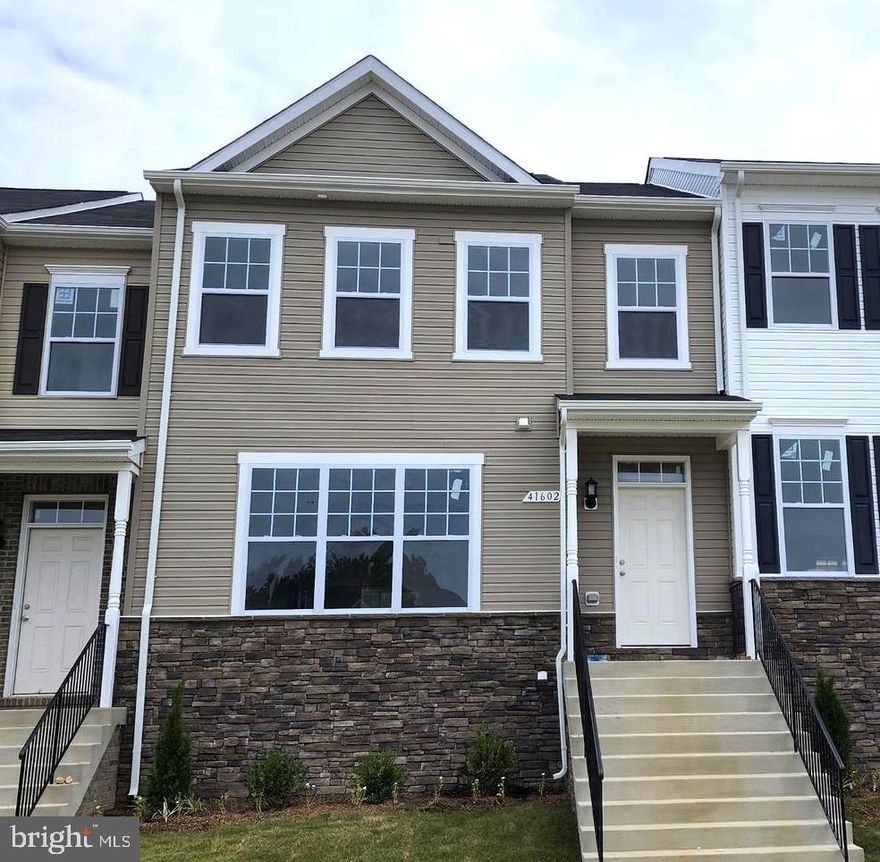 Sold & Settled New Construction Townhome at the Clark's Rest neighborhood in Leonardtown. The Compton # 2 Townhome with rear kitchen layout has over 2400 of total finished living space, featuring a  2-Car Rear Load Basement level Garage w. 3 upper level bedrooms and 2 baths,  a  half bath on the main level, as well as finished basement including a rec room and another full bath. 1st floor highlights include open layout that features a kitchen island w. sink looking into the family room as well as additional peninsula island with overhang into the dining area.  There is also a separate dining room at the front of the home as well as a family room to the side of the kitchen.  Upgraded options featured in this home include vinyl planks throughout the 1st floor, Stainless Steel Appliances including a microwave hood, Granite Kitchen counters w single bowl undermount sink, maple cabinets, ceramic floors and upgraded tub/shower surrounds for the owners bath, ceiling fan pre-wires, upgraded carpet and pad,  plus so much more! 

Community Amenities for the Clark's Rest neighborhood feature a Community Clubhouse, Pool, Basketball , Walking Trails, Tennis Courts, Playground, and sidewalks.