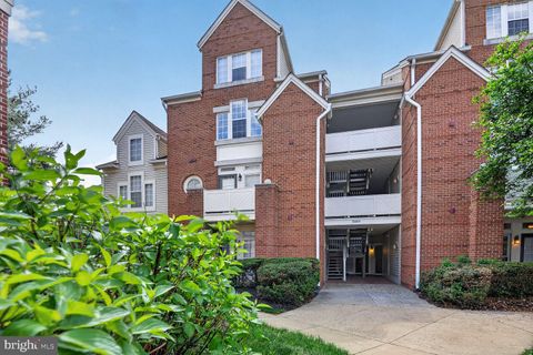 Photo of 6864 Brindle Heath Way #203, ALEXANDRIA, VA 22315 (MLS # VAFX2300454)