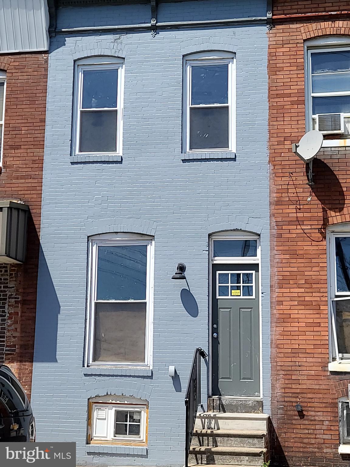 Located a short walk to Hopkins hospital mediical campus. This cozy townhome has been fully renovated and offers beautiful finishes. This Lovely home with cathedral ceilings,recessed LED lights and new floors will impress all who enter. The Modern style kitchen with all stainless steel Samsumg appliances and custom cabinets and granite countertops is a focal point in this open floorplan with living and dining area. As you walk to the upper level, you will find a master bedroom with spacious closet and private marble master bath. The second bedroom offers a double closet and large windows with wonderful natural light flooding the room. The seond full bath offers marble finishes with a custom glass enclosed shower with a skylight dousing you with natural sunlight. In the main hallway there is a second large skylight again bringing in beautiful natural light into this home. Laundry is conveniently located main level so not going into basement to do the wash. Basement is full size and unfinished but could make even more space to this home. New HVAC system, New roof, New plumbming and New Electric systems. Ready to move in and make it your home.
