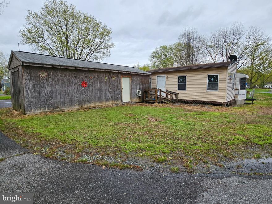 An oversized single corner lot with a spacious 1988 Hyline trailer with 2 bedrooms, two baths, and a shed located in GLEN 3 of Indian Acres Campground. The Campground is limited to 150 days, no more than 100 consecutive days (not a full time residence) yet open year round. So much to do in this community with a lake, two ponds, and a boat ramp to the Sassafras/Chesapeake Bay. Events, convenience store, arcade, pools, and so much more. Come check out all this gated community has to offer as we look forward to meeting you.