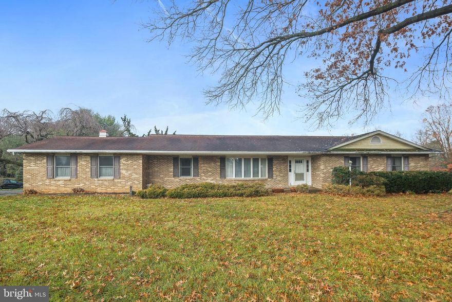 Welcome to 7206 Patton Dr - Discover the potential and incredible value in this solid, all-brick 3 bedroom, 2.5 bath rancher set on a picturesque 2-acre corner lot in a sought-after neighborhood. Priced below a recent appraisal, this home offers an exceptional opportunity for savvy buyers looking for space, privacy, and long-term upside.  Inside, you’ll find a spacious kitchen, dining room, living room filled with natural light from the bay window, a comfortable family room with a wood stove insert in the fireplace, and large bedrooms. The huge unfinished basement provides endless possibilities for future living space, a workshop, recreation room, or storage—ready for your vision.  Major systems have been updated, including a newer HVAC system and hot water heater, offering added peace of mind.  Outdoors, enjoy the mature landscaping, expansive yard, and water supply throughout the property—ideal for gardening or outdoor projects. The setting provides both tranquility and convenience.  While the home needs updating, it presents tremendous potential and instant equity. Sold AS IS. Don’t miss this outstanding opportunity in one of the area’s most desirable locations!  Schedule your tour today!