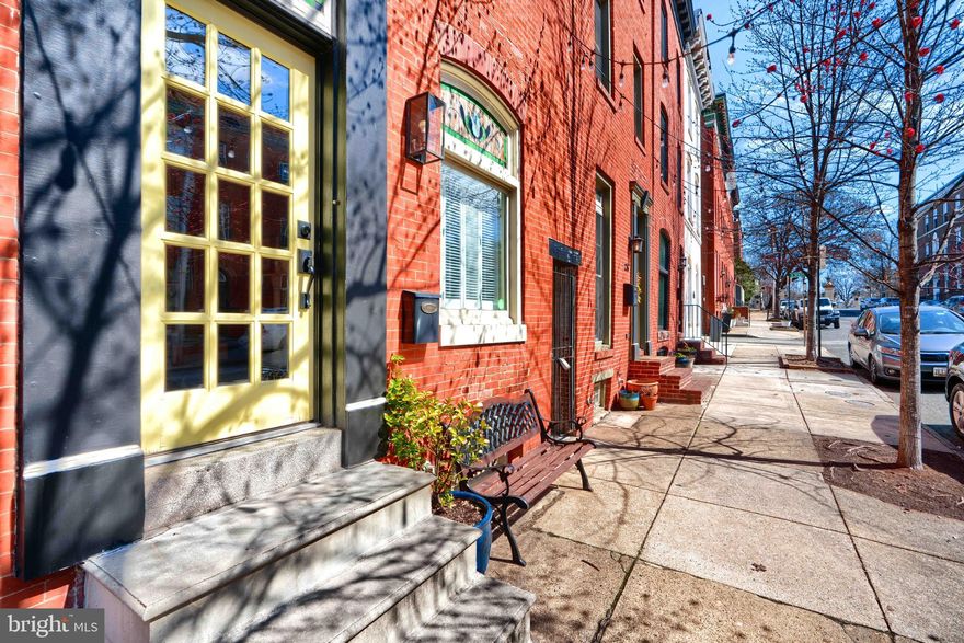 You don't want to miss this one! Ideal Butchers Hill location offering great walkability to local venues, waterfront, Patterson Park, Johns Hopkins Hospital, Kennedy Krieger, & much more! Bonus Parking Pad! Situated on a tree-lined street, this home boasts tons of charm along with modern amenities creating great space for easy day to day living. Meticulous from top to bottom with a warm ambiance throughout. Owner has invested substantial monies in renovations with stunning design features & finishes, gleaming hardwoods, bluestone patio and updated systems. Over 2,000 +/- Sq Ft of finished living space over 3 levels.  Bright and sunny on every floor with windows in front, rear and side of the property.  An interior door to side of property offers access to basement hatch which houses systems and offers storage.   Bluestone Patio & Fence (2021); Major Renovation work (2016-2017) - Kitchen Appliances & Flooring, 2nd Floor complete renovation of Bedrooms, Bathrooms, Walk-in Closet, Laundry area & hardwood floors redone, 3rd floor carpet, Added living room closet;  Roof (2017);  Exterior Siding (2016); Gas Boiler(2016 ) Water Heater (2016). NOTE: Empty oil tank in cellar is no longer in use but remains with the property.