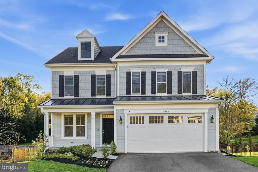 Better than new and loaded with upgrades—this 2023 Sekas-built Harrison model delivers space, flexibility, and a premium cul-de-sac setting in the heart of Fairfax.

Situated on a private, end-of-cul-de-sac lot, this move-in ready home offers exceptional privacy along with ample street parking for guests. Inside, enjoy 9’ ceilings across all three levels and a thoughtfully designed layout ideal for modern living.

The main level features a private bedroom with full bath—perfect for multigenerational living, guests, or a dedicated home office. A stylish mudroom with custom built-ins keeps everyday life organized and clutter-free.

The open-concept living space shines with a spacious dining and family room and gas fireplace, flowing seamlessly into a chef-inspired gourmet kitchen designed for both everyday living and entertaining. Step outside to a screened-in porch and deck with stairs leading to a patio, creating the perfect indoor-outdoor lifestyle.

Upstairs, you’ll find three generously sized secondary bedrooms, each with convenient bathroom access, along with a well-placed laundry room. The luxurious primary suite is a true retreat, featuring a spa-like bath and an expansive custom walk-in closet that one can only dream of!.

The finished walk-out basement expands your living space with a large recreation room, complete with a wet bar, microwave, dishwasher, and beverage fridge—ideal for entertaining. This level also includes a fifth bedroom and full bath, perfect for guests or extended stays.

The fully fenced backyard includes an irrigation system and offers both privacy and usability.

Located in a sought-after Fairfax community and zoned for Woodson High School, this home combines top-tier construction, thoughtful design, and an unbeatable location.

A rare opportunity to own a nearly new home—without the wait.