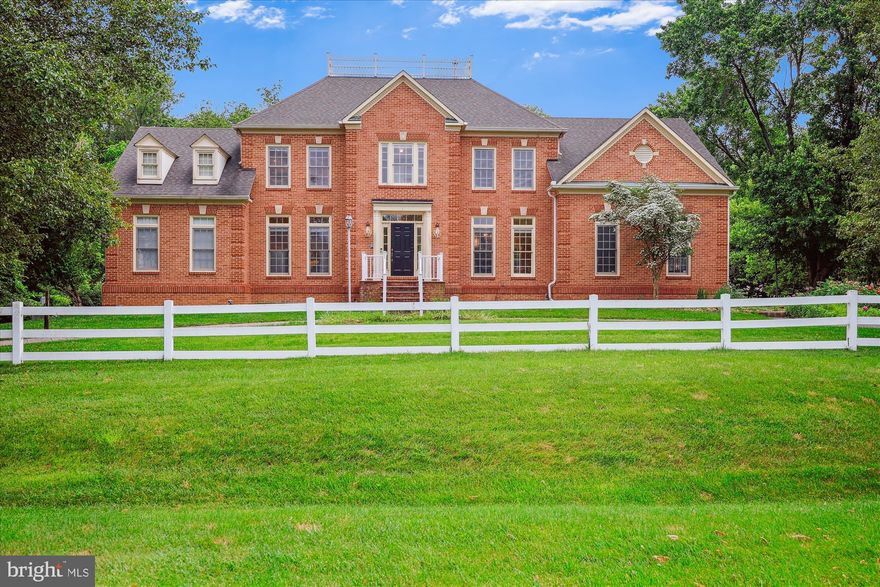 Deadline for contracts if 5 PM Monday, June 3.  
A stunning masterpiece nestled in a bucolic setting, this timeless brick-front colonial is appointed with every amenity for luxury living. Welcomed by an inviting brick front porch and circular paver driveway, this six bedroom, four full and one half-bath home has a fabulous open floor plan with every space imaginable.  There is a perfect balance of formal and casual living space. The main level of this home features a spacious dining room, living room, executive library/office with built-ins and wet bar, and a sun-filled two story Great Room with a marble fireplace.  In addition, on the main level there is a front to back media/movie/music room with an elevated stage area and access to a private deck overlooking the back garden.  A powder room, laundry room, and mud room with access to the over-sized garage completes the main level. The kitchen is open to the Great Room and the deck.  It offers a center island with a five-burner over-sized gas stove, GE Monogram built-in microwave, oven, and oversized refrigerator.  The kitchen also has a desk area, pantry,  and eat-in area.  Cherry cabinets and granite counters accent this large, well planned chef’s kitchen. From the casual kitchen dining area or the Great Room, doors open to an expansive two-tiered deck that overlooks the grounds.  A powder room and separate laundry and mud room with access to the over-sized garage completes the main level. The finishes of this home include crown molding, chair rail, and wainscoting.  The main level has hardwood and marble flooring.  

Perfect for modern living, there are four very spacious bedrooms and three beautiful baths on the upper level. One bedroom offers an ensuite bath.  The two additional large bedrooms share a Jack and Jill bath.  This wing of bedrooms also has a loft area which is perfect as a play area or study area.  It is overlooking the great room with a wall of built-ins for storage.  The primary bedroom offers a tray ceiling, recessed lighting, inviting sitting area/loft with skylights overlooking the media room.  The primary bedroom also offers a spacious walk-in closet with extensive shelving.  The primary bathroom has recessed lighting, a soaking jacuzzi tub, a jet and rainfall shower system, as well as a separate toilet/bidet room. 

For the multi-generation home buyer, or one looking for a private in-law suite, the absolutely incredible lower level of this home is perfect. The kitchen is complete with a full-size stove, refrigerator, dishwasher, sink and bar.  The family room, with a gorgeous stone fireplace has two French doors leading to two separate patios.  There are two very spacious bedrooms, one with huge walk-in closet and easy access to the full size bathroom. In addition, there is a front to back in-home office, perfect for a small staff business. There is a shelved storage room for your rarely used items.  The walk-out lower level is like a second home!

The lot of this home sets the perfect tone for the outdoor space. Mature trees and flowering gardens add the perfect complement.  With a nature preserve type garden, this home provides a lifetime of privacy. This home also has an oversized two-car garage, generator and an EV charging station.  It offers the opportunity to elevate the concept of form and function to an entirely new level!  This home is being sold "as is"