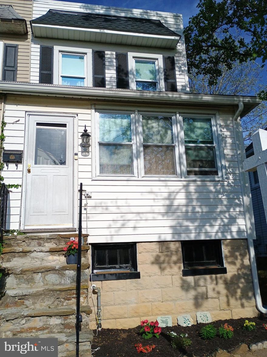 Ask about a 5.75% interest rate, fixed for 30 years!!  Motivated Seller!!  A Hidden Gem with Unbeatable Value! Nestled on a peaceful side street in a prime location, this charming semi-detached home offers the perfect blend of comfort, convenience, and opportunity.  Step inside through the inviting foyer, doubling as a cozy sitting area, and flow seamlessly into a spacious living room—ideal for relaxing and entertaining.  The kitchen is a standout feature with its ample table space, generous pantry, and classic oak cabinetry, plus a rear door leading to a spacious screened porch overlooking the rear yard.  Freshly painted interior walls & trim.  Wall mounted TV in living room is included.  Downstairs, the partially finished lower level has endless possibilities: transform it into a cozy family room, an extra bedroom, or your dream space. There is a laundry area, complete with an included washer.  Upstairs, you’ll find three comfortable bedrooms, including a primary bedroom with a generous closet and sliding door—a ready canvas for creating a second-floor deck retreat. The upper level full bath has been updated with ceramic tile.  Recent upgrades include laminate plank floors, a newer roof, water heater, and boiler, plus nearly all windows have been replaced with vinyl.  With all these updates, this home is truly move-in ready!  This home has a very large fenced rear yard, which is comparable to most single family homes in the area!!  Don't miss your chance to make it yours! TAKE ADVANTAGE OF SPECIAL FINANCING TO PURCHASE THIS HOME!!  Grant programs, down payment and closing cost assistance and special rates for first time buyers!  Back on market due to no fault of the sellers or property (prior buyer would not perform!!)