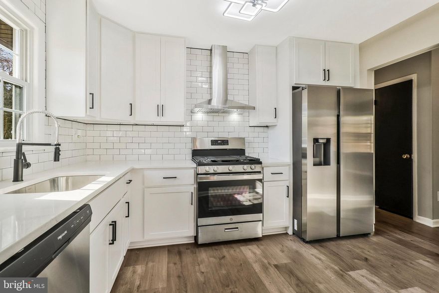 Priced To Sell Fast! Hot Renovated Split Foyer, Spacious Kitchen with QUARTZ Counters, Stainless Steel Appliances, New Cabinets, Modern Tile Backsplash, Spacious Bedrooms, New Custom Paint, Updated Bathrooms, New Flooring, New Lighting, Fenced Backyard, Much More!! Close to Schools, Shopping, and Commuter Routes.  This Will Not Last!