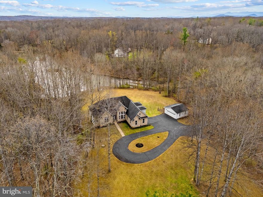 Spend each day on your own private retreat at 16199 Covey Circle! This unique property offers Main Level living with a stunning lake view and access in the Quail Ridge Community - no HOA and XFinity make it a true "unicorn!" The LOVELY Brick-front raised ranch home is set on over 8 peaceful acres and provides easy living with 3 bedrooms on the Main Level & 2.5 Baths, a Princess Suite above the garage, and a bonus room (to code exit, but no closet) w/ full bath in the finished walkout basement (already plumbed for a second kitchen). Each day will feel like a vacation as you wake up in your Primary Suite with fabulous lake view and private deck access.  Enjoy tranquil moments or making memories with family and friends on your expansive composite deck. The property offers waterfront living and access to use of the idyllic lake - fishing, kayaking, canoeing, or simply observe the variety of wildlife! The open floor plan and vaulted ceilings provide a light and spacious interior - this is truly a SPECIAL home and property!  Amissville is conveniently located between Warrenton and Culpeper - offering easy access to amenities from both quaint Virginia small towns!  Multiple Wineries and Breweries are also close by and you are just a short drive to the Blue Ridge Mountains!