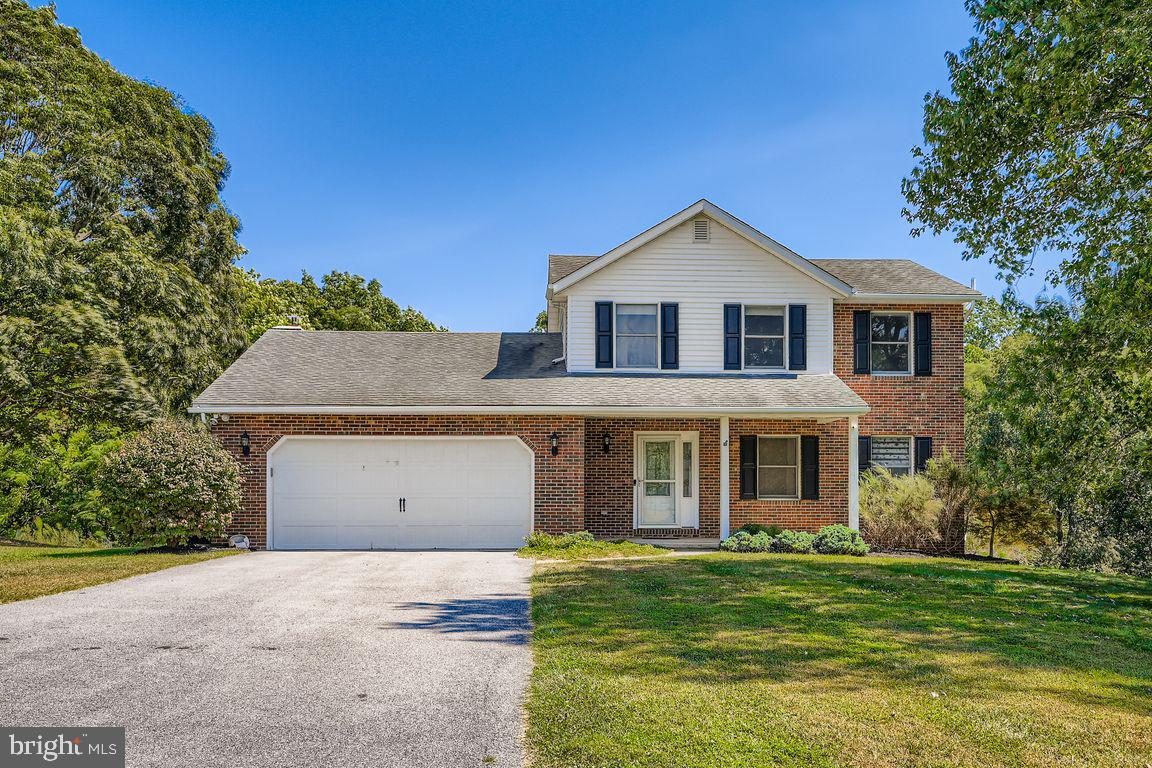 Fully renovated house in prime location in Carroll County. State of the art kitchen with 42" cabinets, quartz waterfall countertop, big separate island, built in refrigerator and dishwasher. Family room with cathedral ceiling, fireplace insert and sliding door to patio. All bathrooms are renovated. Hardwood floors. Finished basement. Large private lot backs to wooded area. Quiet peaceful location, close to route 140 and shopping center.