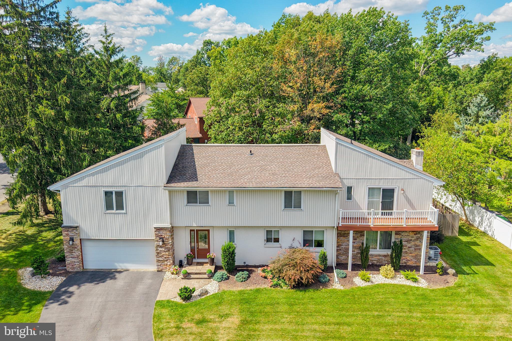 Welcome to 930 Springhouse Road, a stunning blend of contemporary style and traditional charm in the sought-after Parkland School District. Ideally located just minutes from Routes 22, 476 and the ever-popular Wegmans, this home combines convenience with comfort. From the moment you enter, you’ll notice the meticulous care and thoughtful updates throughout the home. The open-concept living and dining room create a bright, welcoming space for everyday living or entertaining guests. The heart of the home is the spacious, eat-in kitchen, complete with ample cabinetry, and modern finishes. The family room, just steps away, offers a cozy gathering spot with direct access to the backyard from a covered porch with an awning—an inviting outdoor retreat perfect for morning coffee, barbecues, or evenings spent with family and friends. The porch overlooks a beautifully maintained backyard that offers space for play, gardening, or simply relaxing. Upstairs, with hardwood throughout, the generous primary suite features a walk-in closet and private en suite bath. Three additional bedrooms and a second full bath provide space for everyone. And the finished lower level adds even more living flexibility with a recreation room ideal for a media area, home gym, or playroom. With its stylish updates, versatile layout, and wonderful location, this home truly has it all. Don’t miss your chance to see it in person