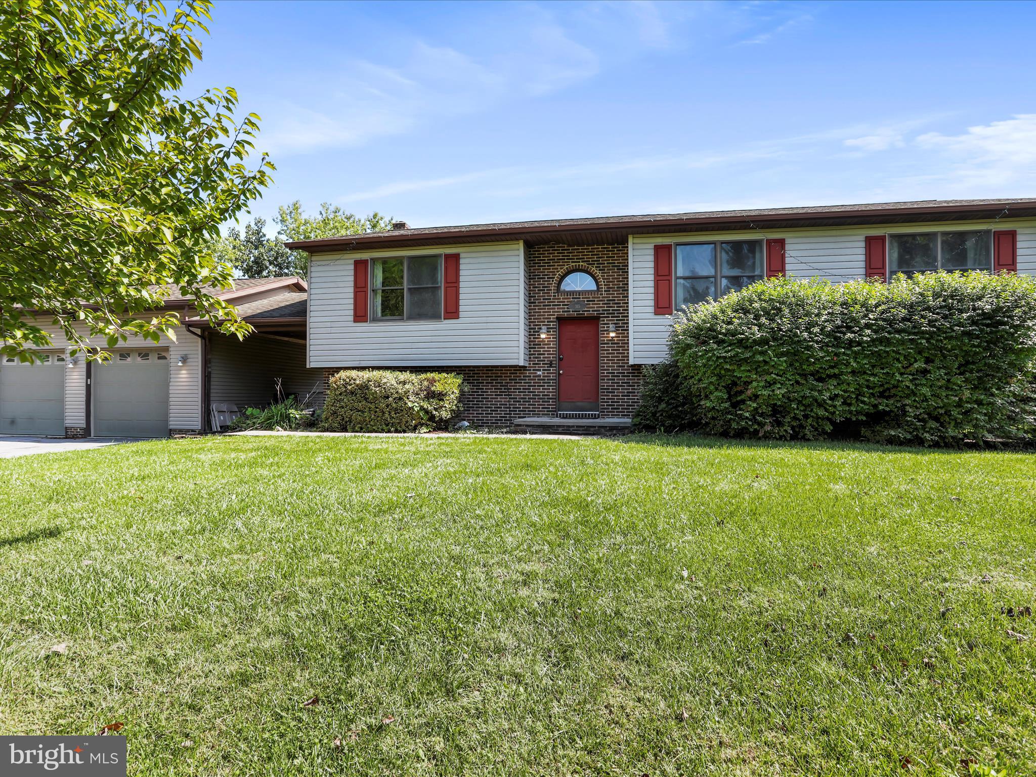 BACK ACTIVE! Welcome to this spacious and versatile 3-bedroom, 3-bath split foyer home nestled on a quiet cul-de-sac. Situated on a private 1.07-acre lot, this property offers both comfort and room to grow. Upstairs, you'll find a bright and open layout featuring three bedrooms and two full baths, ideal for everyday living. The lower level boasts a large recreation room, an additional bedroom, a full bath, and a walk-out unfinished area—perfect for storage, a workshop, or future expansion. Enjoy the outdoors on the rear deck, overlooking your peaceful and private backyard. The home also includes a spacious garage, connected by a breezeway with a cozy sitting area, providing both convenience and charm.
Don't miss this wonderful opportunity to own a home with flexible living space, plenty of privacy, and room to make it your own!