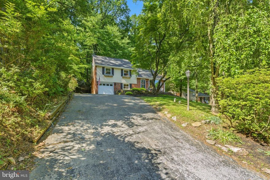 What a value!  Have you been looking for a completely turn key home in one of the best locations around, offering a completely move in ready aesthetic, modern finishes and a backyard oasis?  If so, this is your opportunity! Located in the beautiful Bob White Farms pocket of Wayne, Upper Merion is this completely maximized 5 bedroom, 2 full and 2 half bath split level home with a classic brick curb appeal and lush landscape.  The current owners have made so many thoughtful updates to this home, ensuring its function and appeal.  Pull up and fall in love!  The layout is awesome, offering front to back light and spacious room sizes.  The main level has a large living room with a huge bay window, giving you a magnificent view, recessed lighting and a white oak style flooring.  The living room opens right up to the dining room and kitchen with it's  peninsula with seating, stainless steel appliances, white shaker cabinets and granite countertops.  The dining room has sliders out to the incredible backyard sanctuary.  The lower living level is current used as a playroom but offers a great space for an office, guest room or another den with it's perfectly tucked away half bath and utilities/laundry in its own space.  The attached garage offers a spot for a car and great storage, right where you need it to be.  The upstairs levels of the home gives you great versatility with 5 bedrooms options, a guest suite, primary suite with full bath and overall great room sizes.  The property itself is so beautiful and well maintained.  Mature landscape, a (new) trex deck, custom bar area and the property naturally private.  The current owners have poured so much love and resources into the home.  Professional waterproofing, the front windows, sliding door, kitchen window, the flooring, carpeting, new appliances that will convey with the home, the guest room bathroom, custom closet built-in,  a new roof and the deck!  This home offers more space than most of its style and is truly move in ready!  It's been so loved and is perfectly update.  Take advantage of its incredible location.  You couldn't be in a better spot!  King of Prussia, Wayne, Chesterbrook and easy access to 202, 76 and 476.  Enjoy downtown Wayne attractions in minutes.  An incredible value in 19087!