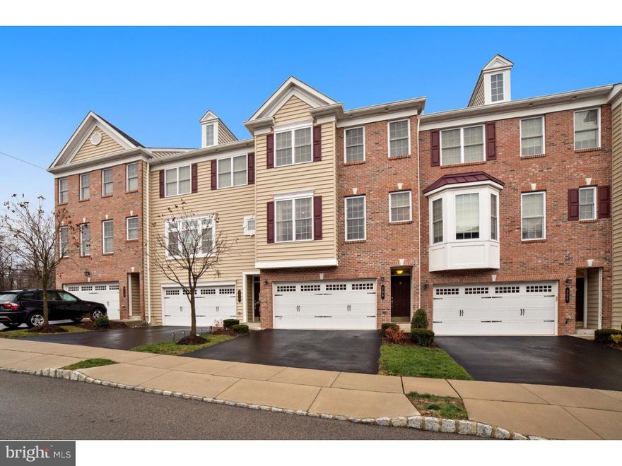 Location, location, location!! Welcome home to this fabulous 3 bedrooms and 2 full and 2 half bathroom 3 level townhome in Station Square Community.  Minutes away from the train station and downtown Ambler where all your popular restaurants, shops, street festivals and parks are in walking distance. The main floor is an open floor concept with an eat in kitchen, plenty of cabinet space, newer back splash and sliding doors that lead to a quaint deck for your summer entertainment. Spacious sun filled  living area/dining room with gorgeous gleaming newer hardwood floors with crown molding thru out in these two rooms. This floor also has a powder room. Second floor has a spacious master suite with tray ceiling  and ceiling fan. The master bathroom has double sinks, enlarged stall shower and ceramic tile. Two additional oversize bedrooms with plenty of closet space and ceiling fans with a full hall bathroom and a laundry facility room. The lower level family room is equipped with a powder room, ample storage area, and sliding doors that you walk out onto a patio/backyard. This level also features access to the 2 car garage. Home has just  had all rugs replaced with plush and a neutral color, newer whole house humidifier, water softener and a brand new water heater.  Home has Energy efficient gas heat & central A/C,  HOA includes Common area maintenance, lawn maintenance and snow removal. The School Dist is Wissahickon, and has been ranked # 1 in the latest school performance profile. This home has it all, so don't miss the opportunity!