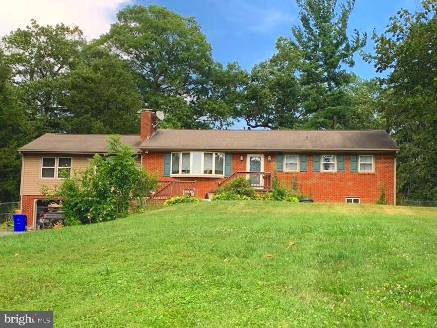 Discover countryside living with this charming 3-bedroom, 2-bathroom home, situated on nearly an acre of land. This property is a perfect retreat from the hustle and bustle of city life, and it is just waiting for you to make it your own!