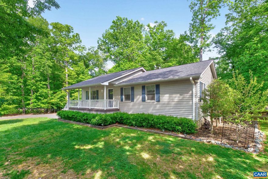 Set on a nearly level lot, this beautifully maintained and thoughtfully updated ranch home offers the perfect blend of comfort and convenience. Nestled on a quiet cul-de-sac and surrounded by mature landscaping, start your mornings on the expansive front porch or unwind on the oversized rear deck. Inside, the open-concept layout features a spacious living room, dining area, and a stylishly updated kitchen. A standout feature is the massive pantry, complete with charming barn doors. The main level includes a generous primary suite along with two additional well-sized guest bedrooms. Downstairs, the partially finished walkout basement offers a large rec room, a dedicated office/study, a full bathroom, and abundant unfinished space ready for storage, hobbies, or future expansion. Recent upgrades include a remodeled kitchen with like-new stainless steel appliances, updated flooring throughout, HVAC system (2018), new roof (2025), and a freshly renovated rear deck. Located about a minute from the Slice Gate, you?ll enjoy quick access to nearby shopping, dining, and an easy drive to Charlottesville. Don?t miss this opportunity?schedule your showing today!,Fireplace in Living Room