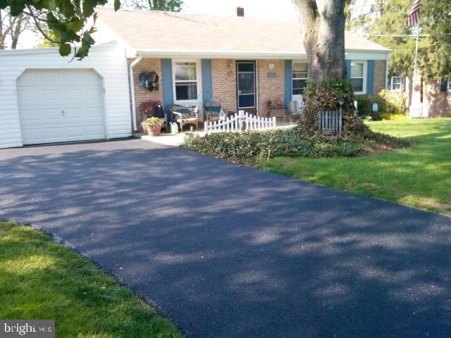 OVER 1,900 SQUARE FEET OF TOTAL LIVING SPACE! One story home with a 1 car garage. Well maintained and beautifully landscaped. Gas heat C/A. Huge deck overlooking a spacious back yard. Hardwood floors throughout. Finished basement with a family room and the 3rd bedroom. Walk out entrance that leads to the Hot Tub. Handicap ramp on the side of the homes that leads to the rear deck. Recently painted, new driveway, Roof recently replaced. MUST SEE