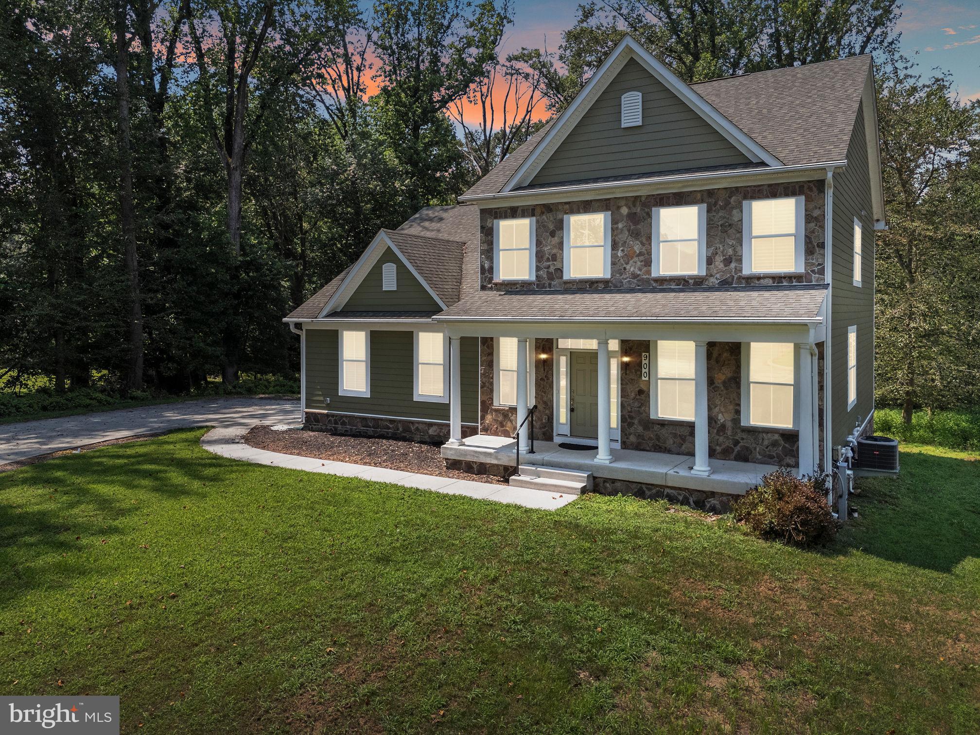 Be only the second owner of this beautifully upgraded custom home, built in 2017 and loaded with modern amenities and thoughtful touches throughout.
Set on nearly an acre of wooded serenity, this stunning property features charming Hardie Plank siding, a welcoming front porch, and expanded interior spaces including a widened kitchen and a custom separate dining room.
The chef’s kitchen boasts Corian countertops, stainless steel appliances, a large walk-in pantry, and a generous island perfect for gathering and entertaining. It flows seamlessly into a spacious dining area and an inviting living room. Real hardwood floors run throughout the main level, which also includes a dedicated sitting room or study; ideal for working from home or quiet reading space.
Upstairs, you'll find three large bedrooms, two beautifully appointed full bathrooms, and one of two convenient laundry areas.
The fully finished walkout basement is a true bonus! Designed as a complete apartment, with its own kitchen (sink, dishwasher, and cabinetry), full bedroom, den (second room), full bath, second laundry area, and a bright 4-season room.
Step outside to enjoy the newly added composite deck, featuring a state-of-the-art, covered swim spa—perfect for year-round relaxation or fitness.
Additional upgrades include new carpet, a tankless water heater, EV charging ports, and more. With quality construction, smart updates, and low-maintenance living, this home offers peace of mind for years to come.