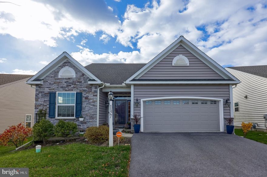 Better Than New! Built in 2019! Check out this stunning move-in ready home featuring a bright and open layout with a first-floor primary suite, a finished lower level, and an upper-level guest suite with a loft. Just minutes to Millersville University, Crossgates Golf Course, and Willow Valley. The two-story foyer welcomes you into the spacious open-concept kitchen, dining, and living areas — perfect for entertaining. The kitchen boasts stainless steel appliances, a center island with seating, and a cozy breakfast nook with a sliding glass door leading to the maintenance-free deck. The living room offers a vaulted ceiling with skylights, a ceiling fan, and a warm fireplace for relaxing evenings. The main level also includes a laundry room, a second bedroom, and a full bath for added convenience. The finished lower level expands your living space with a large family room featuring a wet bar, a full bath, and generous storage areas. Upstairs, you’ll find a third bedroom, a full bath, and a loft — a great setup for guests or a private retreat. Located close to parks, restaurants, shopping, and local amenities with easy access to major roadways — ideal for commuters.