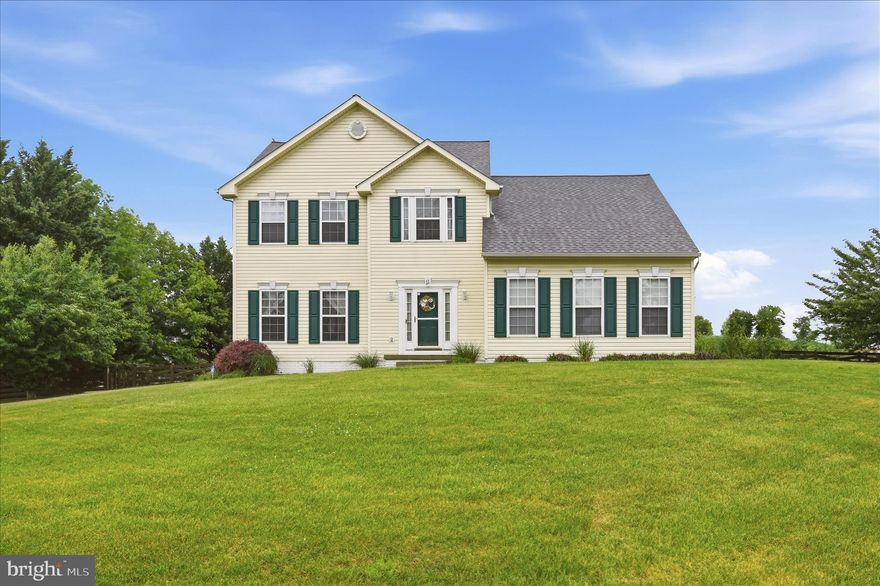 Located in the highly sought-after Gap View Village community, this beautifully maintained Colonial-style home offers space, comfort, and privacy on a fenced three-quarter acre lot.  Surrounded by mature landscaping that provides exceptional summertime privacy, the outdoor setting creates a peaceful retreat perfect for relaxing or entertaining.  Inside, the impressive two-story living room welcomes you with soaring ceilings open to the upper level and a cozy pellet stove that creates the perfect gathering space during cooler months. The spacious kitchen is designed for both function and entertaining, featuring granite countertops, a center island, a dedicated coffee bar area, and newer updated appliances. A partially finished basement with a full bath adds flexible living space ideal for guests, recreation, or a home office.  Upstairs, the expansive primary suite offers vaulted ceilings, a walk-in closet, and a luxurious en suite bathroom complete with dual vanities, a relaxing garden tub, and a separate tiled shower. Secondary bedrooms are all generously sized, providing comfort and flexibility for family or visitors alike.  ***Roof 2021 with 50-year, architectural shingles and transferable warranty***Heat pump 2025***Water heater 2026***
