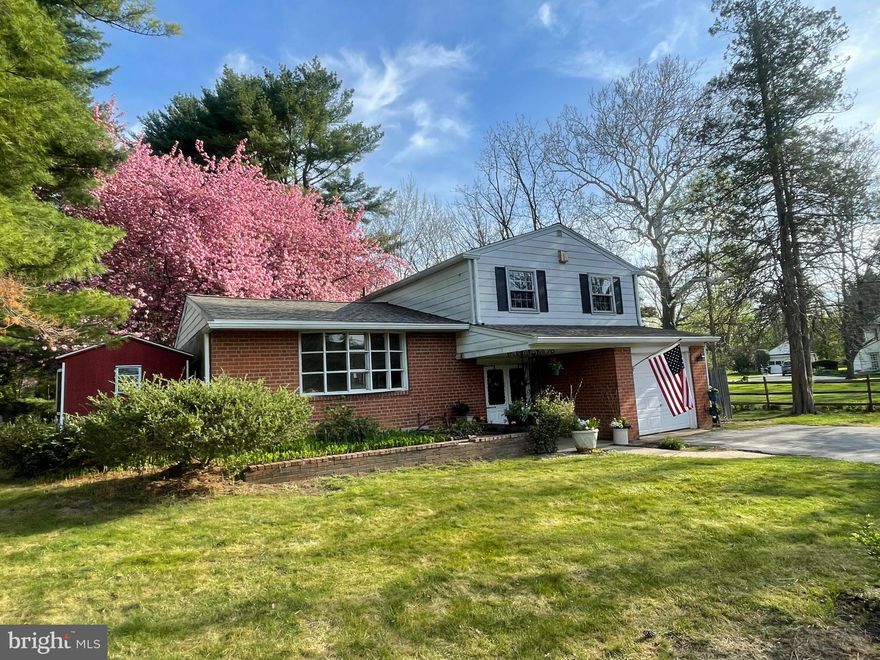 Hooray - finally a property that's affordable, has low taxes, & is in award winning Blue Ribbon Great Valley Schools.  A solid brick home with a partially fenced level Yard, that has many perennials like Lilys of the Valleys about to pop into Spring colors, & 2 marvelous blooming cherry trees - which will provide shade in the Summer months around the corner! This one is a lot about the lovely LOT!!!  You can make it into whatever you want- with a little TLC - it will appreciate in value!  Walk down Malin Rd. to shopping & restaurants, close to a traffic light to slow traffic, hop on Chester Valley Trail & go all the way to the Schuylkill River- this one is priced right & ready to go QUICK!  There are hardwood floors in the Living / Dining Room combo space and lots of windows let nice natural light and cool breezes in!  Spacious Kitchen w/ gas stove, & Lower Level Family Room, with Laundry Room, Foyer, Coat Closet, Storage Closet, & 1/2 Bath.  The attached garage is oversized, has HVAC ductwork(future Mudroom Laundry Rm?) & there's a handy work bench shelf.  Upstairs has hdwd. flrs. in all 3 Bedrooms, & large tile Hall Bath.  Potential to redo the Hall Bath & MBTH& make a new Jack n Jill Bath!  Out back there's almost a 1/2 acre to play & run around if you have dogs or kids!  There is a Patio & Deck accessed from Lower Level Family Room, & the Fire Pit, Hammock,& most of the Planters are included - ready to help you start to enjoy the lovely Spring weather!  Updates like newer Roof & Heater allow you to move in, and work on it as you can...  One of the best things is the setting & partially fenced Yard - next to a larger  charming historic property built by one of the Malin brothers  Circa 1720!   When the road is named after the family that lived there - you know your location was part of the local history & chosen for a reason back in the day!  Settled centuries ago, ready to be whatever your dreams can make it into!  OPEN FRI. 3-6, SAT. 10-1, & SUN. 1-4  This property really does have A LOT OF POTENTIAL & a LOT of interest - so Giddyup!  Seller prefers to sell "AS-IS" & offer deadline may be SUNDAY after OPEN - stay tuned! It is ready for your ideas & the very convenient location close to the Main Line & all it offers makes it a wonderful oasis to call HOME!