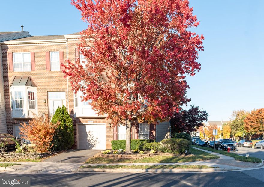 Welcome to this well manicured, end row townhome with multiple new upgrades!  Move-in ready for the new owners.  Upon entering the home you'll notice the hardwood floors running throughout the first floor and the recent fresh painting.  The living room is spacious and provides a wonderful built in book shelf and plenty of natural light.  Move onto the kitchen and you'll notice the laundry room and an area for a bar, small office, or whatever you decide.  The kitchen offers recently painted cabinets and granite countertops along with a breakfast nook.  The dining room offers a great fireplace and mantle with access to the back deck via a sliding door.  The deck is spacious and overlooks a recently installed $25,000 stone patio.  
Continue upstairs to the oversized primary bedroom with walk in closet.  Off the primary bedroom is the primary bath which includes a double sink, privacy toilet, jacuzzi soaking tub and a standing shower.  Moving back down the hall you can see the open space and great light coming through the huge window overlooking the front door.  The next two bedrooms are comfortably sized and there's an additional full bath located right next to them.  
Finally, head on down to the basement.  There is great track lighting throughout and plenty of space for a gym, family room and office.  The entire basement carpet is also brand new!  Move on to the garage and notice the freshly painted floor upon entering.  There is room for a single vehicle and plenty of extra storage room.  Moving on outside through the sliding glass doors you'll notice the brand new Carrier Infinity Series HVAC unit (installed in August 2021).  The backyard also offers a brand new wood fence and the previously mentioned stone patio.  
This home offers so much and was recently furnished with over $50,000 in multiple upgrades.  It's ready for it's next owners!