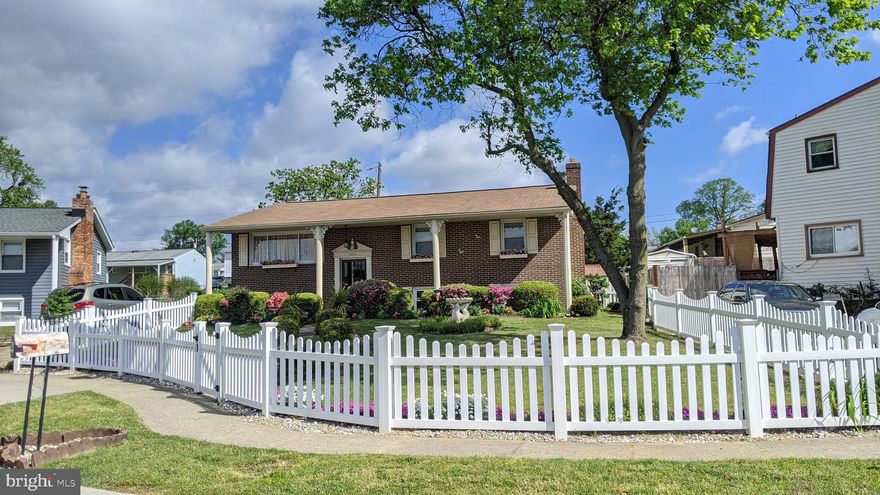 How pretty is this home!!!  The love shows all over by the way the owner has cared for her home!  The white picket fence and the beautiful landscaping  welcomes you into this lovely, lovely home.  5 bedrooms, 2 full baths and a large family room with a gas fireplace.  So much room everywhere!  Enjoy the new gas HVAC and HWH that was replaced in 2019.  New pergo flooring, updated kitchen and baths.  New ADA height toilets. Walk in shower on main level with a double vanity and double entry to hall and to primary bedroom.   Easy maintenance vinyl deck off of the dining room overlooks a private rear yard.  Off street parking on your own driveway but plenty of extra parking on the street as well.  Gutters were also replaced in 2019. Updated carbon monoxide and sealed smoke detectors.  Convenient to shopping, restaurants and highways!  Seller requests 30 Day Rent Back following Settlement.