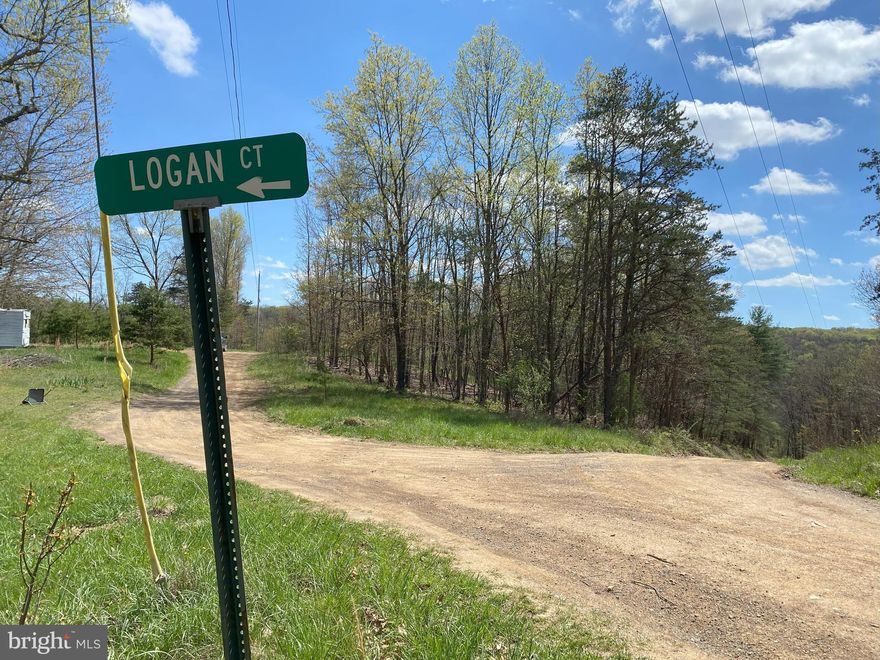 GREAT LOT IN FRENCHBURG ESTATES WITH WELL AND SEPTIC ALREADY INSTALLED!  THIS LOT PREVIOUSLY HAD A MOBILE HOME ON THE LOT AND THE ELECTRIC POLE IS ON THE PROPERTY.  THE LOT CONTAINS 3.50 ACRES AND IS LESS THAN 2/10 OF A MILE FROM RT. 50. PROPERTY HAS A LEVEL AREA TO PUT A DOUBLE WIDE, MOBILE HOME OR BUILD YOUR PERMANENT HOME. 
PLEASE USE FRENCHBURG ESTATES DRIVE TO GET TO THE LOT, OLYMPIC DRIVE IS A VERY ROUGH ROAD AND YOU WILL NEED A VEHICLE WITH HIGH CLEARANCE.