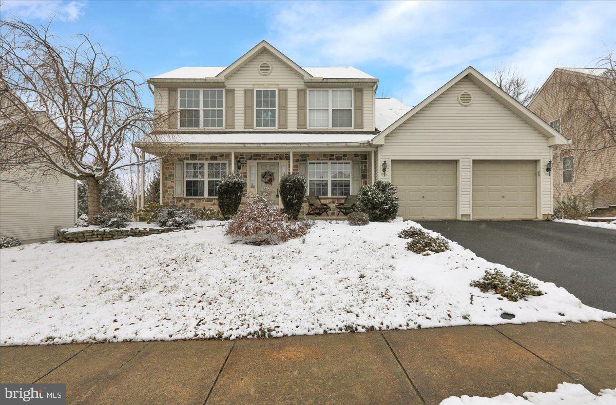 Great 4 bedroom home in Bryn Mawr Estates, Conrad Weiser School District. Two story front entry onto hardwood flooring. Separate formal living room and dining room. The spacious kitchen has a peninsula of base cabinets that is open above for a great flow to the breakfast area. Kitchen appliances are included. The family room has a gas fireplace, and a triple window for plenty of natural light. There is a first floor laundry room for your convenience. The second floor has an open balcony landing and 4 spacious bedrooms. The master bedroom ensuite bathroom features a soaking tub, stall shower and a double bowl vanity. There are 3 more bedrooms and a hall bathroom. The deck from the breakfast area is a vinyl trex material. The lower level has poured concrete walls , daylight windows and a walk-out patio door, making it a perfect area to finish to your liking. The plumbing was roughed in for a 2 pc bath in the LL. A gas line was run to the master bedroom for a future FP. There is a spacious level backyard with a split rail fence.
