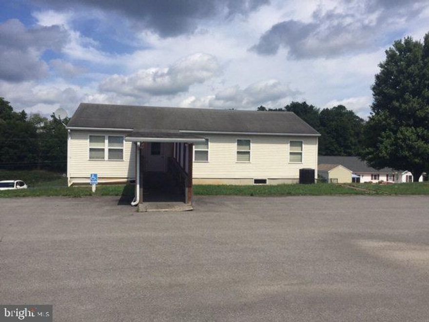 2 unit Commercial building in Parkview Heights on Ruger Lane.  Tons of paved rear parking.  Covered wheelchair ramp.  Private drive into the property.  Both levels have handicapped accessible restrooms.  Heat pump and central air.  Downstairs has foyer, small office w cabinets, Large office, large conference room, 1/2 bath, kitchenette & utility room.  Upstairs has entry room, large L shaped room, 1/2 bath, storage & rear room to outside.,Rear of property is paved with spacious parking area