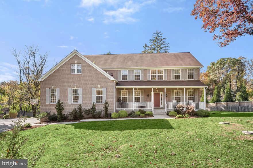 Discover the charm of this magnificent home boasting six bedrooms and five-and-a-half bathrooms, with an enviable and convenient Greenspring location. Situated at the end of a cul-de-sac, this exceptional home is adorned with enchanting landscaping and a welcoming covered front porch. As you step inside to the foyer, the hardwood floors greet you, complemented by a soothing neutral color palette that flows seamlessly throughout. Host gatherings with ease in the spacious living and dining rooms designed to accommodate all your entertaining needs. The gourmet eat-in kitchen is a chef’s delight, equipped with stainless steel appliances, granite countertops, a stylish tile backsplash, 42-inch cabinets, a walk-in pantry, and a convenient center island. Adjacent to the kitchen, the breakfast nook features sliding glass doors to the heated four-season enclosed porch — a serene escape for relaxation. The family room, bathed in natural light from sun-filled windows, offers a cozy retreat, complete with a gas fireplace for chilly days. The main level also houses a versatile office with an attached private full bathroom, presenting an ideal setting for a home office or a potential main level bedroom. Journeying upstairs reveals the opulent primary bedroom suite — a true sanctuary featuring a soaring vaulted ceiling, a gas fireplace, and an expansive walk-in closet. The luxurious primary bathroom indulges with heated tile floors, a generous soaking tub, a glass-enclosed walk-in shower, a dual-sink vanity, and a separate water closet. The second and third bedrooms share a well-appointed hallway bathroom with a convenient upper level laundry room. Down the hall, the fourth and fifth bedrooms share a connecting bathroom. The fully-finished walkout lower level unfolds as a versatile space to meet various needs, boasting a massive recreation room accommodating diverse activities. The sixth bedroom on this level serves as a perfect guest retreat, complete with a closet and a full bathroom. Venture outdoors to the expansive private level rear yard offering a playground area and a convenient storage shed. This home is a harmonious blend of elegance, functionality, and outdoor enjoyment, promising a lifestyle of comfort and sophistication. With the sunroom addition, the estimated square footage is approximately 6,300 square feet.