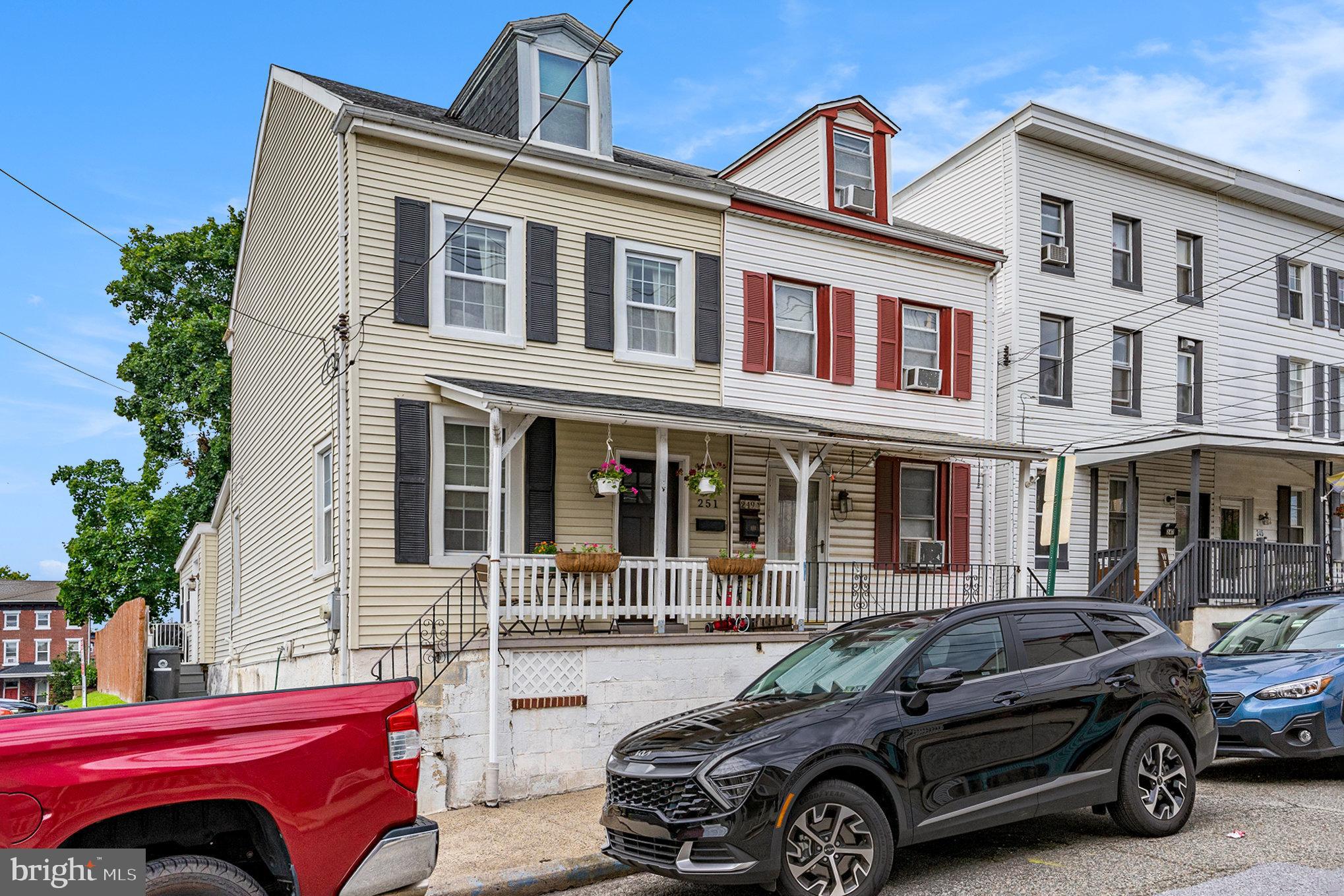 Welcome to 251 Hall Street, an absolutely charming twin nestled in the heart of vibrant downtown Phoenixville. From the moment you step onto the picture-perfect front porch, this home radiates warmth and character. Inside, original exposed ceiling beams and gleaming hardwood floors set a timeless tone, while the neutral color palette offers the ideal canvas for your personal style. The cozy dining area flows into a beautifully updated kitchen featuring bar seating, pendant lighting, and ample cabinet and counter space. A versatile bonus room at the rear is ideal for a home office, reading nook, or den, and a powder room with a stylish sliding barn door completes the main level. Upstairs, the primary suite is a true retreat with more exposed beams, a hint of exposed brick, a spa-like ensuite with dual above-counter sinks, a walk-in closet, and convenient second-floor laundry. The third floor features two additional spacious bedrooms—perfect for guests, kids, or creative space. Outside, unwind on the private deck in your fully fenced backyard, complete with a garden bed for the green thumb in you. Located just steps from Bridge Street’s lively shopping, dining, entertainment, and the historic Colonial Theatre, this home offers the perfect mix of small-town charm and walkable urban energy. With easy access to Routes 23, 29, 113, and 422—and just a short drive to King of Prussia and Valley Forge National Park—this home truly has it all. Plus, Phoenixville was just ranked the Best Small Town to Live in the U.S. by Travel + Leisure, thanks to its walkable downtown, vibrant arts scene, affordability, green spaces, and strong community roots. Come see it before it’s gone!