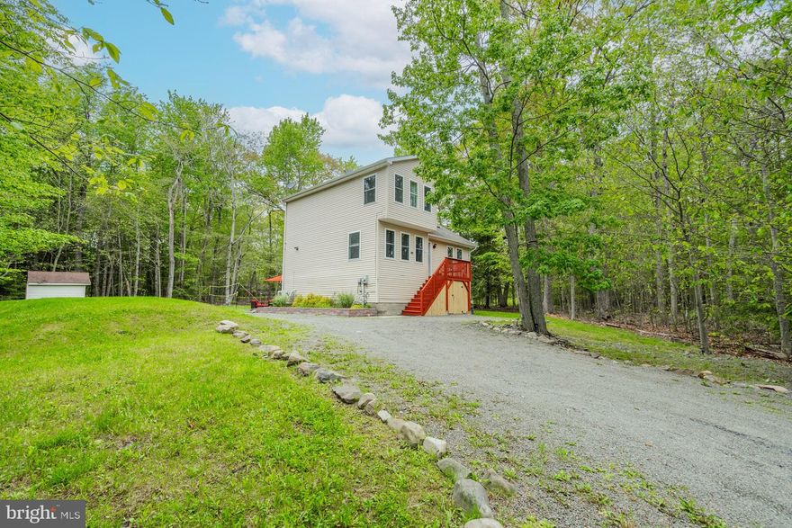 This beautifully renovated 3-bedroom, 3-bathroom home is the perfect blend of comfort, charm, and opportunity. Built in 2006, it welcomes you with cathedral ceilings, a cozy fireplace, and a bright, open floor plan that makes you smile the moment you walk in. The spacious dry basement offers endless possibilities—think game room, home theater, or extra storage! Tucked away on a peaceful cul-de-sac with only a few neighbors, this property is a serene retreat while being part of a community offering fantastic amenities like lake/beach access, golf, recreation, and more. Located in a short-term rental-friendly community, this home is ideal for year-round living, a weekend getaway, or a lucrative rental investment. The Poconos are calling—come enjoy the beauty, adventure, and relaxation this area has to offer! Schedule your showing today and turn this dream home into your reality!