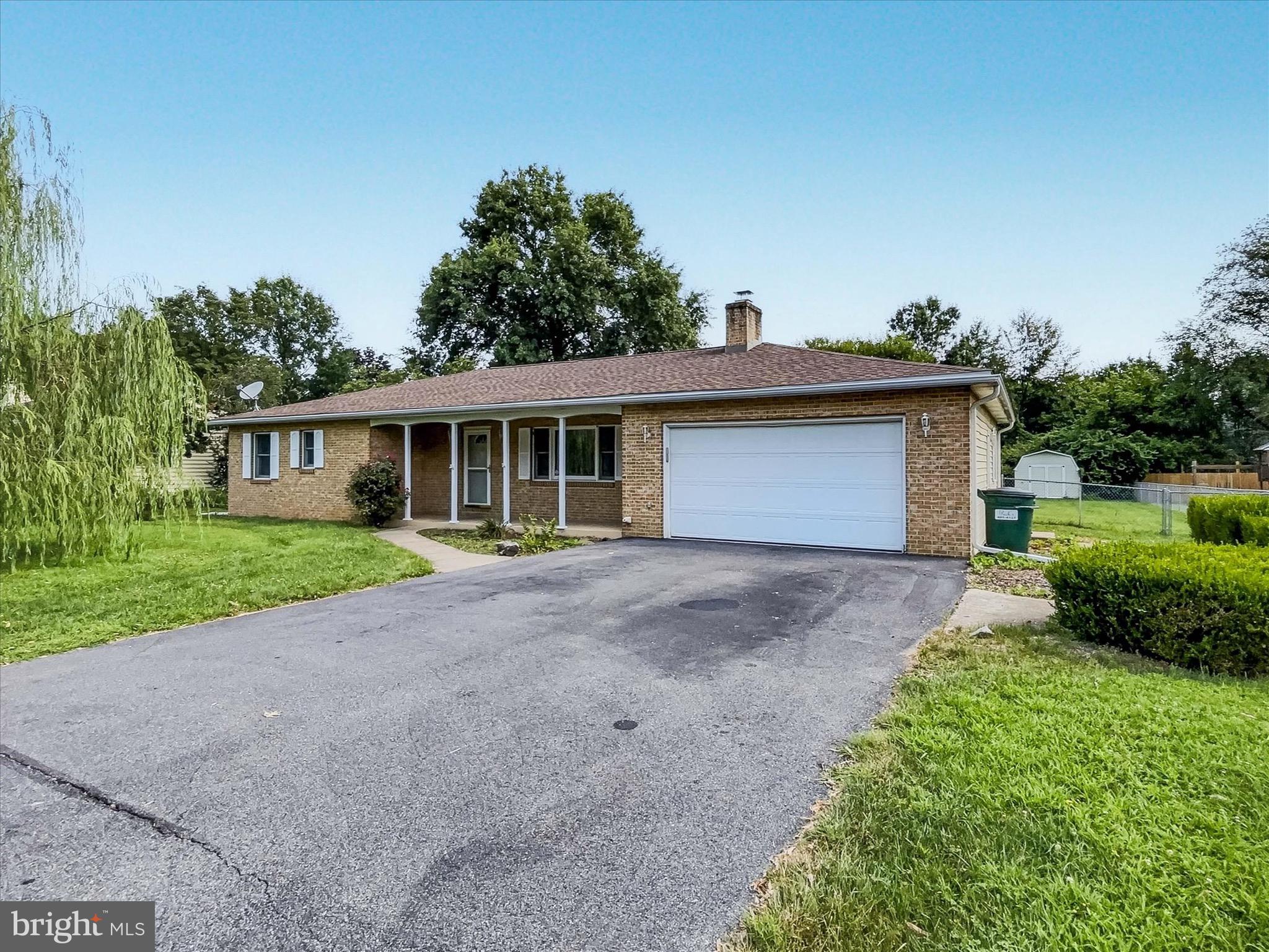 Back on the market due to financing falling through. Discover 85 Jackson Drive in Chambersburg’s Greene Township! Offering 1,550 sq ft of living space with 3-4 bedrooms and 2 full bathrooms all on one floor. This property includes both a garage and plenty of driveway parking, providing convenience and functionality. Located in the Chambersburg School District, the home features a spacious fenced yard on nearly half of an acre. The newer roof and HVAC are sure to provide years of peace of mind. The sunken living room boasts a beautiful brick fireplace and mantle. The flex room off of the kitchen will be perfect for a 4th bedroom, home office, or den. With a little cosmetic TLC this home will shine bright! Call today to make this home your own! Ask about no money down USDA financing and flexible seller financing options available!