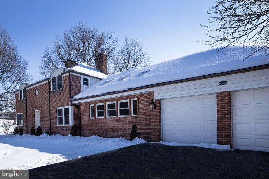 Here is your chance to live on Italian Lake, Harrisburg's most prestigious area! This is 1 of only 8 properties on Parkside Ln. This all-brick beauty has Newly installed roof, windows,patio, privacy fencing, garage doors and has been freshly painted. Four bedrooms, a first floor master & another master bedroom on the second floor! Three full baths with pristine vintage tile work. The kitchen has granite countertops, a tile backsplash, stainless steel appliances, and a double oven. The HUGE living room offers a wood-burning fireplace and views of the lake, hardwood floors everywhere, tons of natural light! Convenient second floor laundry, closets galore, a loft that overlooks the kitchen makes for work space. The basement has heigh ceilings, another fireplace, and is currently a GYM!