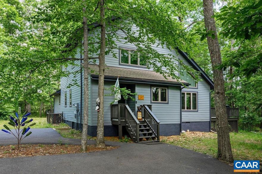 Beautiful 4 BR, 3 BA home privately located on a level homesite. The main floor of the house offers a primary suite and a guest bedroom with a full bath. The kitchen is open towards the dining area and the great room, offering plenty of food prep and storage space.  The great room is bright, boasts cathedral ceilings, and features a stone, gas-logs fireplace. Upstairs you will find two cozy guest bedrooms and a full bath. The deck off of the main level is very spacious and wraps around one side of the house. In addition, the owners have created a fun outdoor sitting area around a chiminea. There is also a fenced yard for your beloved pets. A shed offers great storage for your tools and sports toys.  The home is privately set amidst beautiful Wintergreen vegetation. You will find old-growth Rhodedondron bushes, a big sassafras tree, and even a few of the rare Ladislipper plants. The flora variety on this 0.4-acre lot is simply amazing. Many substantial improvements here over the last 5 years, including a new roof, all-new interior paint (4 years ago), brand new exterior and deck paint (summer of 2024), a new water heater, new kitchen appliances (except dishwasher), rebuilt chimney and much more. Paved driveway with spacious parking,Oak Cabinets,Solid Surface Counter,Fireplace in Great Room