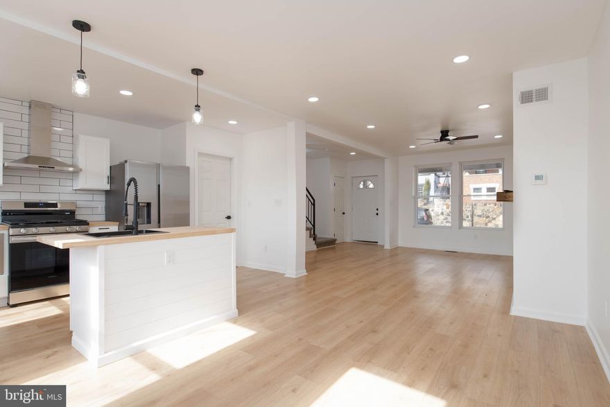 Welcome to your beautifully updated home that blends style and comfort! The heart of this home is the fully updated kitchen, featuring stunning new butcher block countertops, stainless steel Samsung appliances, and a convenient island, perfect for meal prep and entertaining.

Enjoy the warmth of new luxury vinyl plank (LVP) flooring throughout the lower level, complemented by a cozy fireplace in the living room, ready for your TV setup above. This inviting space is perfect for relaxation and gatherings.

Upstairs, you'll find brand new carpet throughout, leading to a fully updated bathroom showcasing modern finishes. The fully finished basement offers even more versatile living space, complete with new carpet and a second fully updated bathroom—ideal for guests or additional family members.

A brand new HVAC system ensures year-round comfort, and the home also includes a garage and a parking pad in the rear, providing convenience and added value.

Don’t miss the chance to make this stunning home yours! Schedule your showing today and experience all it has to offer!