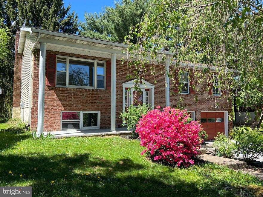 Welcome to this beautiful split-entry home with a charming brick front, ideally located just minutes from downtown State College, Penn State, and a nearby 
CATA bus stop. The upper level features three spacious bedrooms and two full baths, along with a recently remodeled kitchen, granite countertops and newer 
appliances. A bright dining area and sun-filled living room create a warm and inviting atmosphere. The lower level offers a spacious family room, an additional 
full bath, and a convenient laundry area—perfect for everyday living or entertaining. Outside, enjoy a fenced backyard filled with seasonal beauty. Each spring, 
the property comes alive with a stunning weeping cherry tree and vibrant tulips, followed by four colors of azaleas, Siberian irises, and roses. Throughout the 
summer, the backyard blooms with beautiful hibiscus, creating a private garden retreat. Complete with a two-car garage and flat driveway, this home offers the 
perfect blend of comfort, functionality, and location.