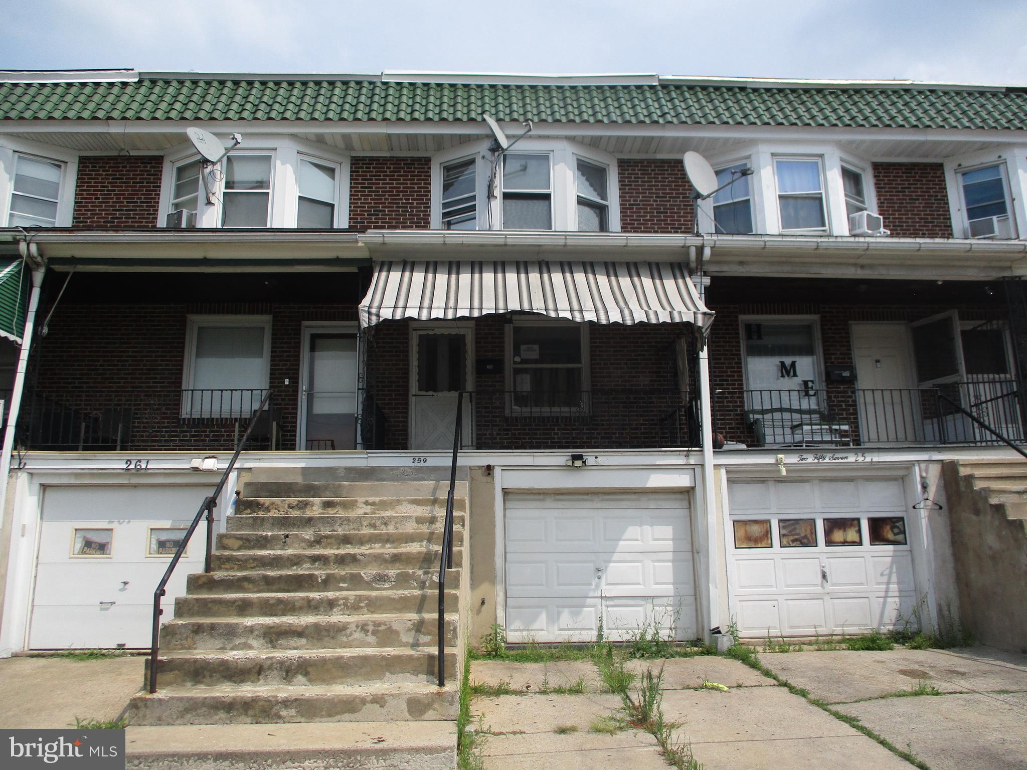 This brick home is in a great location within the city offering easy access to downtown and major roads. There is a cozy front porch offering city views and also a basement garage and driveway for parking. There is wood flooring throughout the home and appears to have been updated recently with paint and updated kitchen & bathroom. Move right into this property or add it to your rental portfolio. Immediate possession.