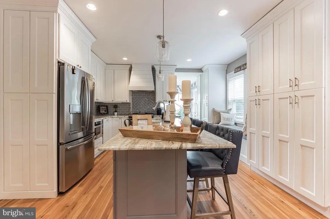 Charming and spacious rental opportunity in the heart of Doylestown Borough! This beautifully renovated 1919 twin home offers three finished levels plus a walkout, finished basement. The main floor welcomes you with hardwood flooring throughout, exposed brick, tons of natural sunlight and customized window treatments. The upgraded chefs kitchen features gas cooking, sleek white cabinetry, stainless steel appliances, and ample storage space. On the main floor you’ll also find a dual-purpose mudroom and laundry space along with a powder room. The second level offers two large bedrooms with great closet space and an updated full bath featuring a double vanity and a spacious walk-in shower. The top floor features a large bedroom with sitting area and full bath ... perfect for guests, office, or flex space.
Outdoor amenities include a private yard (tenant responsible for mowing—lawn mower provided) and charming covered front porch with rocking chairs included. Plus an oversized 2 car driveway for convenient off-street parking. Modern conveniences include HVAC with gas heat, gas hot water, and an optional customizable security system.
Located just steps from shops, dining, cultural attractions, and the County Theater, this property blends old-world charm with modern updates. Pets are permitted with landlord approval.