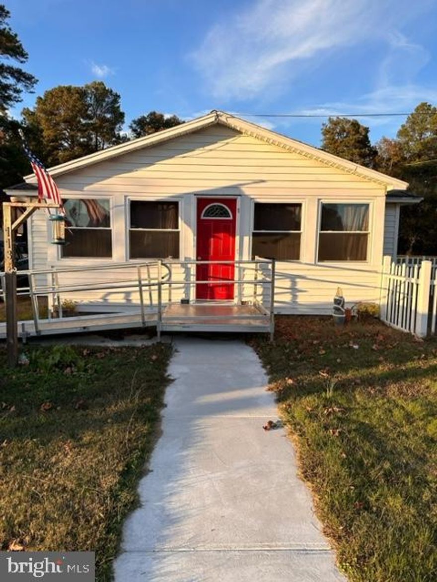 Enjoy in-town living in this adorable 2 bedroom, 1 bath home with a 3 car detached garage.   There is plenty of off-street parking with a private driveway.   There is a front porch as well as a small area outside blocked off for your family pet.   This is being sold AS IS.   Owner will not be making any repairs.       House needs minor cosmetic work but has been well taken care of.
