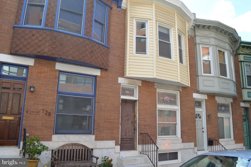 Shell condition home across the street from the new apartment building next to Patterson Park. Lines in the home are true and layout offers a "clean slate" to finish as you like. Large windows, stain glass, natural wood flooring & alcove in the front BR on the 2nd floor. Basement is about 6'3" deep w/ raised wood floor in front. Gas, hot air heating was updated. No boiler or radiators in the home.