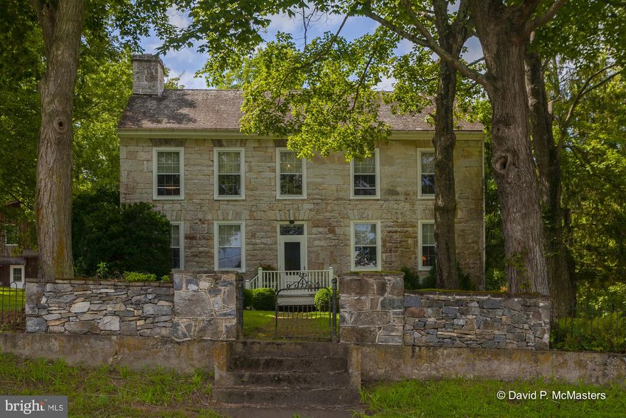 LINDEN SPRINGS, ca 1789, AN HISTORIC 11 ACRE FARMETTE,  Jefferson County Landmark, IN SHEPHERDSTOWN WV.  LINDEN SPRINGS' FEATURES INCLUDE 4 SPRINGS, A POND,  A WONDERFULY RESTORED LARGE 2 STORY STONE COLONIAL HOME, Original wide plan hardwood floors throughout.  Five fireplaces. Kitchen with center island and large stone fireplace. A boxwood lined walkway leads to the exterior entrance. The double two level double porches provide wonderful peaceful areas to relax and enjoy the natural surroundings.  The upstairs bedrooms open to the covered porch. The kitchen opens to the lower porch and provides a perfect area for outdoor meals.  Property is surrounded by mature trees. Across the driveway from the main house is A SEPARATE 1990 BUILDING WITH TWO large  GUEST OR EXTENDED FAMILY highly attractive  APARTMENTS.  THERE ARE ALSO 5000 sq. ft. MORTON BUILDING, A DETACHED GARAGE/workshop   A SPRING HOUSE WITH A  holding tank for trout,  AND MULTIPLE GARDENS ACCESSED BY 2 BRIDGES ACROSS THE STREAM that runs through the property.  There is a pond.  There is a building for chickens as well as a building to house the sheep that roam along the stream near the garden area. It is Unrestricted.  THE PROPERTY IS ON BOTH THE NATIONAL HISTORIC REGISTER AND THE JEFFERSON COUNTY HISTORIC LIST.  A small Moler family cemetery is on the property.  This peaceful, beautiful property has a restorative effect in a troubled world.  It speaks of another time of graceful living and time to enjoy family and friends.  Located near downtown Shepherdstown, a University town, 3 miles from the MARC Commuter train station to DC, 50 miles from Washington DC or Baltimore Md., close to the Potomac River, the C&O CANAL and the Appalachian Trail.  The area provides wonderful cultural and outdoor activities; hiking, kayaking, canoeing, fishing. Bring the family, bring your friends, bring your animals; grow your vegetables,  great for children to wander and enjoy the beauty and wonder of nature.   Possible Air B&B, Bed and Breakfast, Family Compound.  Highly appealing property.  Rare find on the market. The huge pole barn has many possible uses. Lots more information is included in documents If your real estate search engine permits access.