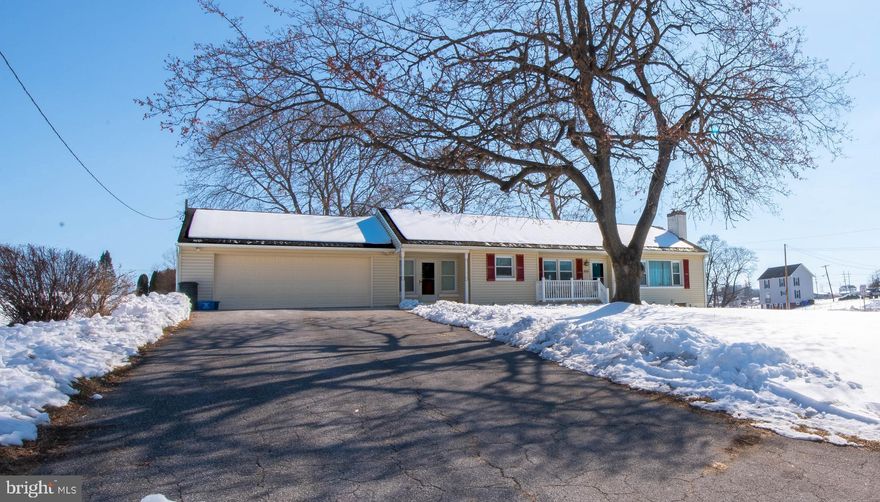 Welcome home to this charming 3-bedroom, 1-bath rancher nestled on a large, flat lot in the heart of  Union Bridge. With beautiful country views and room to spread out, this property offers the perfect blend of comfort and charm. Step inside to find an eat-in kitchen full of character — the perfect spot for morning coffee or gathering with family and friends. Just off the kitchen, the inviting living room features a cozy wood-burning fireplace, creating a warm and welcoming space to relax (and hardwood flooring under the carpet). The heated breezeway connects the home to the oversized two-car garage and doubles as a main floor laundry room and mudroom — ideal for keeping everything organized year-round. Outside, you’ll love the expansive patio, perfect for entertaining. The generous flat lot offers endless possibilities for gardening, play, and so much more. If you’re looking for classic charm, functional space, and tranquil small-town living with scenic views, this Union Bridge gem is ready to welcome you home!