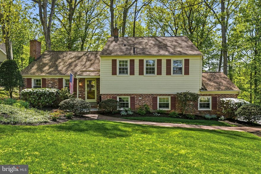 It’s not every day that a home cherished for over 60 years becomes available—but this exceptional property is now ready for its next chapter.  A true gem, this beautifully maintained brick colonial split-level offers over 2400+ square feet of living space, and has been thoughtfully updated all the while preserving its timeless appeal.
Set on a picturesque, professionally landscaped .70 acre lot, the home is surrounded by stately properties on a mature, tree-lined street. A brick and flagstone walkway set along vibrant seasonal plantings creates a welcoming first impression.
Inside, you’ll find gleaming hardwood floors, recessed lighting, quality Pella windows (a couple are Anderson Windows), and elegant architectural details such as an arched doorway and timeless style. The spacious layout includes a formal living room with fireplace hearth and a dining room with a wall of windows leading out to the screened in porch with skylights, ceiling fans and beautiful year round views. The kitchen is spacious and features classic dark wood cabinetry and granite countertops.   The family room features custom built-ins and a dedicated TV center, while a just beyond you'll find a vaulted office or craft room filled with natural light from skylights and windows.
Additional highlights include a powder room, a generous mudroom and laundry area, along with an attached two-car garage all on this level.
Upstairs, the second floor hosts a primary suite with dual closets and a full bath with shower, along with two additional bedrooms, a hall bath and closets. A third level provides a spacious fourth bedroom with ample closet space and a walk-in attic offering even more storage. 
Meticulously cared for, this home features a newer roof, high-quality windows, and updated HVAC with a heat pump and oil backup. A gas line is also available on the street for future conversion if desired. Located in the award-winning T/E School District in Tredyffrin Township, this home offers a superb Devon location—just a short walk to Jenkins Arboretum. Storybook charm meets everyday comfort on picturesque Castlewood Drive—this is a rare opportunity you won’t want to miss.