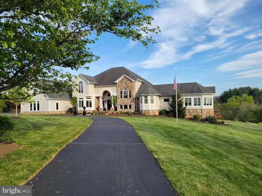 Coming April 2026 - Ripple Creek Farm
A spectacular, custom built home with over 8,090 sq ft on nearly 25 acres of land just 2.5 miles North of Purcellville with quick and easy access to Rte 7 and Rte 9.  Enjoy the gourmet kitchen & open floor plan with main level master bedroom, dual staircases and many, many custom upgrades not found in other homes. This home also has laundry availability on both the main & upper levels. Finished lower level with custom bar, move theatre room and gym with Universal machine..  Entertaining privacy with outdoor pool/hot tub, custom built fireplace, covered deck, bar and grill. 

*Buyer's pre-qualification letter prior to showings*


Custom home features include:

Hardi-plank siding
Comcast high speed internet
4 zone gas heating/air w/humidifiers
2 commercial water heaters
Commercial appliances such as Wolf stove, GE Monogram refrigerator and Napoleon exterior grill
Open concept Kitchen and Family Room 
Dual walk-in closets in MBR with large steam shower 
Hardwood floors throughout the house
Custom lower lever including home theatre w/120"screen/4k display, seating for 9, custom bar, pool table, gym w/Universal Gym Machine, spare bedroom and a massive shower for 2
Whole house audio (including pool) 
Wired security system in addition to 8 Google Nest hardwired cameras
Whole house water softener system
Whole house vacuum
Invisible Fence System
40 Amp EV Charger
Professionally applied epoxy garage floors


Exterior features include:

Easy access to Rte 7, Rte 9 and 2.5 miles to Purcellville
Custom stone entrance with gate
Extensive fencing to include 3-4 paddocks and nearly 15 acres inclusive of Catoctin Creek 
4 Stall, 2 story barn w/electric and water
Riding ring
40' Equipment Shed
Fruit trees and professional landscaping
Gunite pool w/hot tub and custom pergola with fireplace setting
Large Trex deck with covered/uncovered areas, granite counter tops and custom grill
Extensive professional low voltage lighting

*Property in Loudoun County Land Use. Recertified 2022, next certification in 2029. Seller not responsible for potential roll-back taxes if the new owner removes the property from the program*