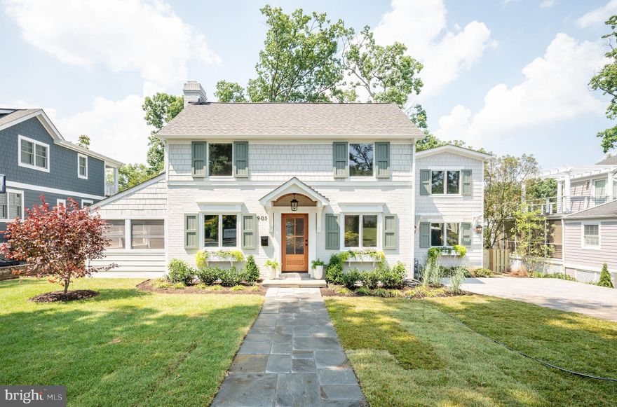 Beautifully done renovation/build by  renowned local builder Morris Construction, This 6 bedroom, 5 bath home features over 4200 square feet in the main home plus an additional bedroom, bathroom, kitchen and laundry in the 426 square foot guest cottage/ADU. With thoughtful touches like custom trim work and built-ins to designer lighting and tile - this house is a dream! From the moment you drive-up, you will be charmed. With window boxes, custom wood shutters and shaker siding, this house has fantastic curb appeal. Enter into the foyer, and you will find the dining room on your right and bedroom/study to your left. The dining room features board and batten trimwork and a sleek gold chandelier. The office has custom built-ins and is wrapped in a soothing gray paint - making this room fun and cozy at the same time. Just off the office is a screened porch, which is perfect for working from home or sipping morning coffee. The office has access to a full bathroom with green square tile, a wood vanity and gorgeous lighting. Head to the rear of the home, which is truly the heart of this space. The kitchen is both functional and beautiful and features shaker-style cabinetry with gold pulls and knobs plus an oversized island- ideal for entertaining or everyday meals. The 48 inch range with wood hood is a chef's dream! Off the kitchen is a family room with built-in window seats, a gas fireplace and easy access to the rear screened porch and deck - great for indoor/outdoor living and hosting friends and family. Rounding out the main floor is a convenient mudroom with lockers for storage that is located off the side entrance/driveway. Head upstairs to four bedrooms and three full baths plus laundry. The primary suite is a fabulous retreat - airy and spacious, this room boasts a walk-in closet with custom shelving and a spa-like ensuite bathroom with a soaking tub, large shower and a double vanity with great storage.  The second bedroom has another ensuite bath with a shower, and the two front bedrooms share a hall bath. The laundry room has fabulous, fun tile and has a utility sink plus cabinetry for storage. On the lower level, you will find a recreation room with built-ins, guest room with full bath, gym area and utilities/storage. Great for overnight guests or movie night! To the right of the home is a sweet guest cottage - thoughtful touches like a TV cabinet that opens behind a mudroom nook make this tiny home functional. A full kitchen plus living area are on the main floor. Head upstairs via wood spiral stairs to the bedroom level that has a full bath plus laundry! The backyard is flat and fabulous! Fully fenced - the yard is a great play area or gardener's dream. Located in the Beverly Hills neighborhood - a gem in Alexandria with access to parks (including the Pit Park!),  just minutes to I-395, a short walk to the DASH bus to Pentagon, 7 minutes to Reagan National Airport and close to Fairlington, Shirlington, Del Ray and Old Town, you will love living at 905 Eldon. Welcome Home!