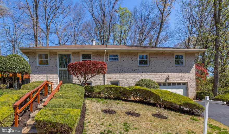 Over 2600 Sq Ft  with  LOCATION  AT IT'S BEST!  View the Virtual Tour and see the floor plan enclosed.   All Brick Home in Sought after Chain Bridge Forest on nearly 1/3 Acre, 50 yards from private CBFA trail on Pimmit Run to the Potomac!  Extensive Hardscape, Slate Patio/and Stairs, Built-In Gas Grill off the Dining Room/Living Room with Floor to Ceiling Windows. Pull Down Attic Stairs with attic fan.  HUGE Rec/Family Room with Wet Bar and New Carpeting, Built-In Book Shelves, TV Wall Jack, Surround Sound Speakers, Addt'l Storage & New Laminate Floors in hall and Au-pair suite.  This carefully maintained, solid built home comes with an HSA One Year Home Warranty!  Generous Sized  Rooms,  4 Bedroom, 3.5 Bath 2 Car Garage,  Professionally cleaned and completely painted neutral. Two Gas Fireplaces,  Whole-Home Generac Generator, Main Level Hardwood Floors, Loads of Natural Light, Walls of closets with shelving, Remodeled Baths and Eat-In Kitchen with Granite Counters, & Large Wall Pantry.  Extra Energy Star Upright Freezer, Walk-In Cedar Closet, 2nd Pantry /Wine storage/shelving in the Laundry Room with Washer & Dryer, and Utility Tub/Sink.  Aprilaire, & New High Efficient 75 Gallon Hot Water Tank, also a FAQ Binder on the kitchen counter.  Low Maintenance yard with rocks, stone walls, timber lined walk/stairs and walls, perennials, Holly/Evergreens, Ground Cover and Underground Irrigation Sprinkler System.  Covid 19 precautions in place, EASY to see, with shoe booties, disposable gloves, sanitizer, at the door, liquid soap and paper towels at all sinks.  Make plans to  see it today!