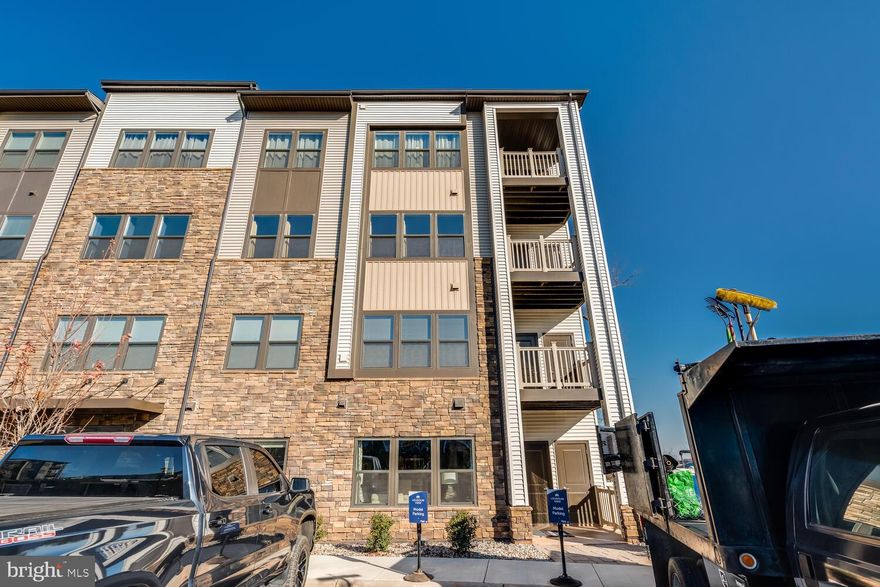 Beautiful Model Home for sale in Loudoun View Condos near Cascades Overlook Town Center. This stunning, modern first floor condo is equipped with all you need for luxury, high end living in the heart of Sterling. The brand new 2 bed, 2 full bath condo features an open floor plan with gourmet kitchen including new stainless steel appliances, beautiful cabinetry and large center island, perfect for entertaining. Condo fees include a pickleball court, playground, basketball court, pool and recreational area as well as water and a reserved underground garage parking spot. Convenience is at your fingertips with the shops, grocery stores and restaurants at Cascades Town Center, as well as Potomac Run Plaza, Target and Costco less than half a mile away. Luxury and convenience await you on Mount Milstead Terrace! Welcome home!